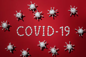 concept-of-covid-19-in-red-background-4031867_weboptimiert